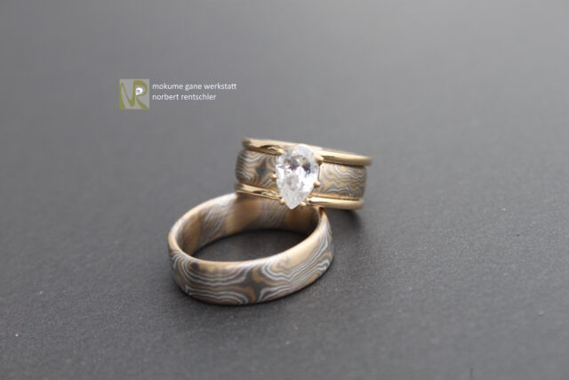 E81 Mokume Gane Trauringe Verwandlung