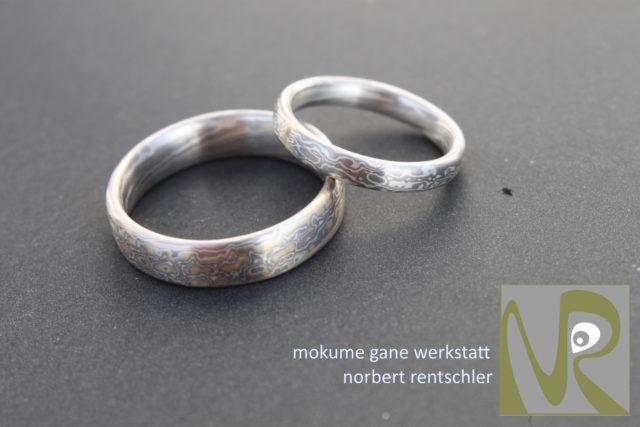 G4F248 Trauringe Mokume Gane zweierlei